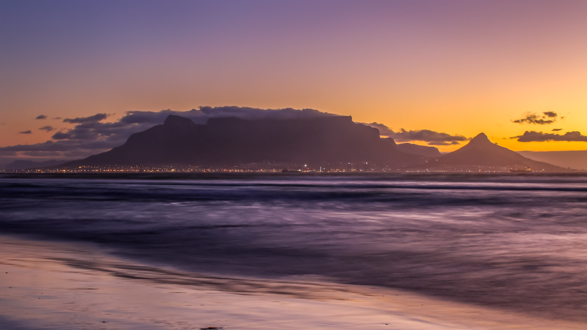 Golden hour sunset over table mountain in Cape Town, South Africa